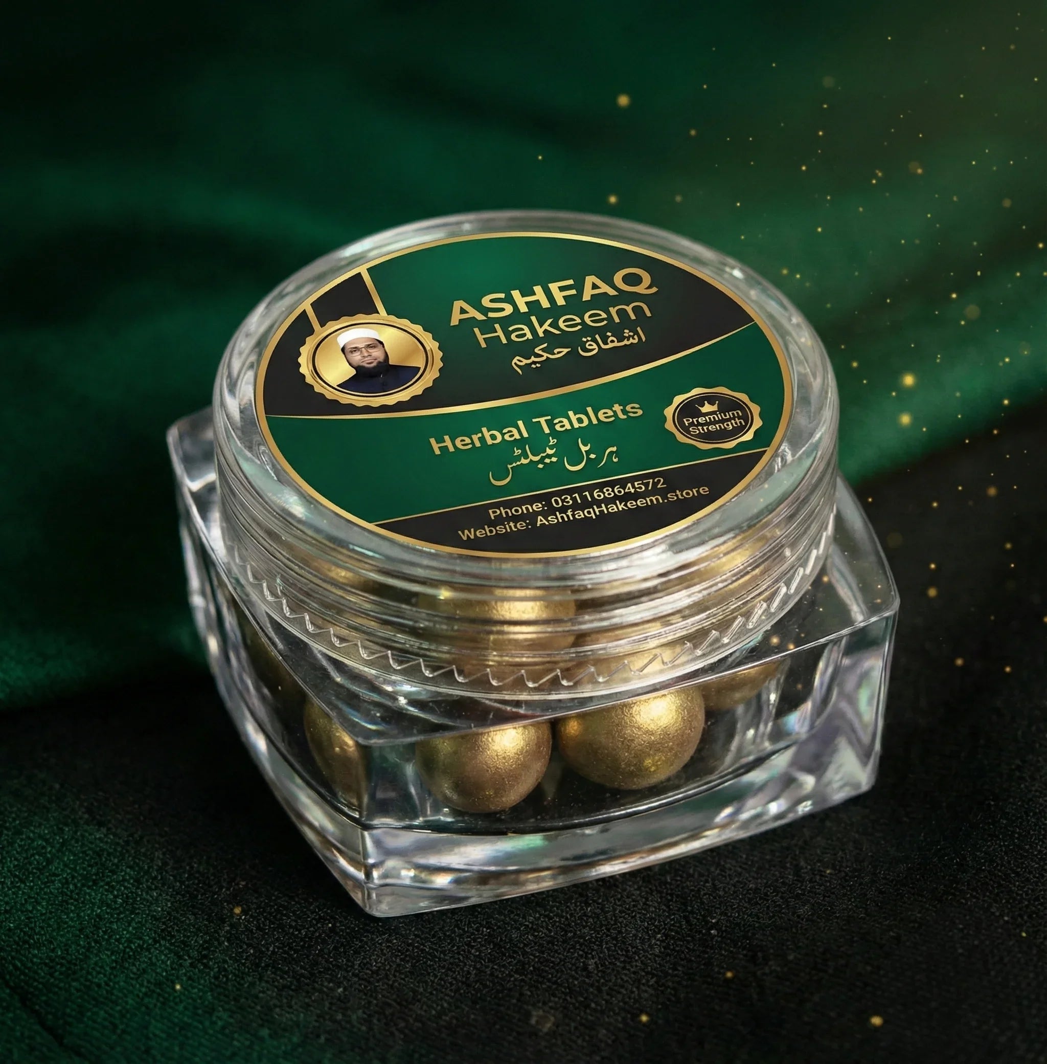 ASHFAQ Hakeem herbal tablets in a clear jar with gold label, on green fabric background