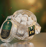 ASHFAQ Hakeem Zaaafrani Tablets in a clear jar with saffron strands and product label.